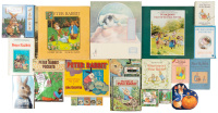 Shelf of novelty books and music featuring Peter Rabbit