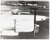 [Howard Hughes sitting in the cockpit of the second FX-11 prototype]