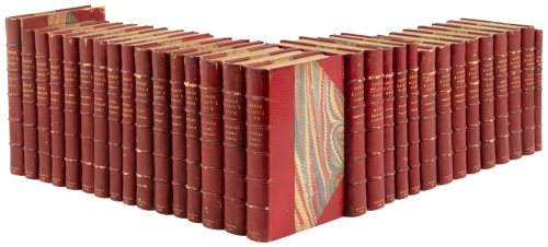 Set of 12 first editions of works by George Eliot and one work about her