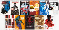 11 volumes of 100 Bullets trade paperbacks