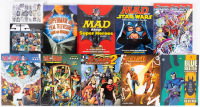 Variety of paperback compainion books for All Star, MAD, Blue Beetle, The Titans, and more