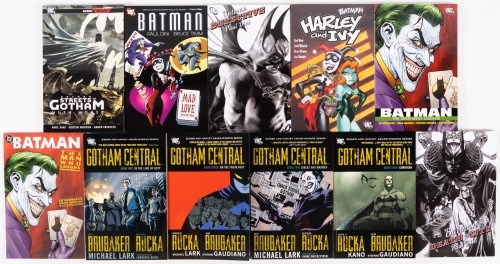 Seventeen volumes of Batman by Ed Brubaker or Paul Dini