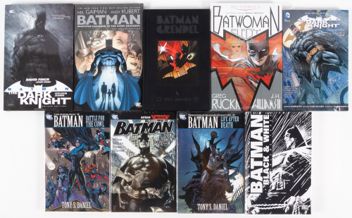 Nine hardcover volumes of Batman