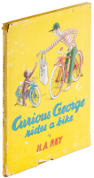 Curious George Rides a Bike