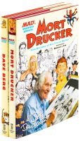 Two volumes of MAD's Greatest Artists featuring Mort Drucker and Dave Berg