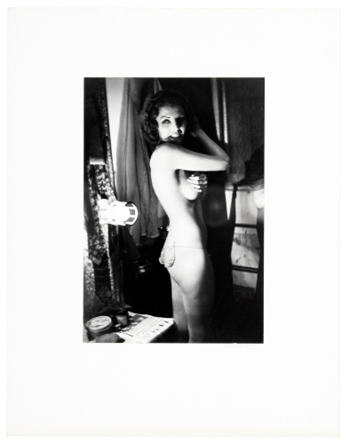 [Dressing room at the burlesque theater]