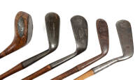 Five Spalding & Bros. golf clubs