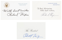 Three cards signed by Richard Nixon as President