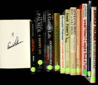 Lot of twelve books on or by Arnold Palmer, signed