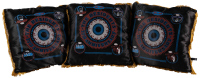 Three 25th Anniversary throw pillows