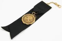 The Tin Whistles metal fob medallion