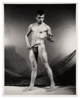 One photograph of model with sword in studio