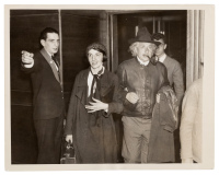 Press photograph of Albert Einstein with pipe