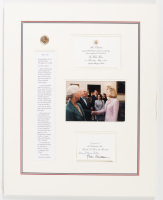 Framed photograph, signatures, coin, and letter to Hillary Clinton from Donald S. Carmichael