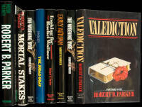 8 signed volumes by Robert B. Parker