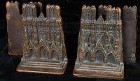 Two Pairs of Verona bookends in the shape of Rheims Cathedral.