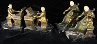 Two pairs of J. Ruhl bookends, cellist and pianist.