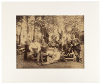 Group portrait of a German turnverein/social club with swords and keg of Bartholomay Brewing Company beer