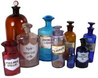 Lot of 9 colored glass apothecary bottles
