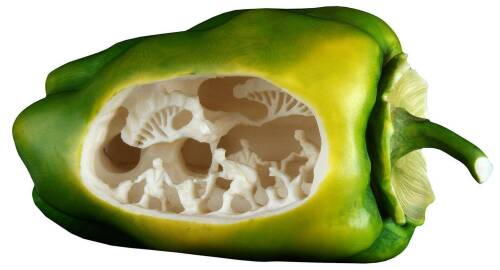 Polychrome ivory bell pepper with a delicate carving inside