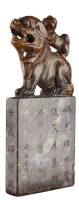 Carved Chinese stone seal with a large dog on which rides a small dog