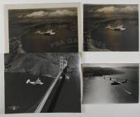 2 gelatin silver photographs of flying boats over the bridges of San Francisco Bay