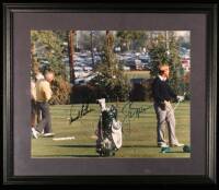 Color photograph of Nicklaus & Palmer golfing, signed by both, framed