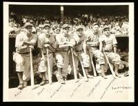 Photograph of six Brooklyn Dodgers from the 1942 tream, standing on the edge of the dugout with bats