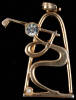 Gold pendant by Medici, of an abstract golfing figure