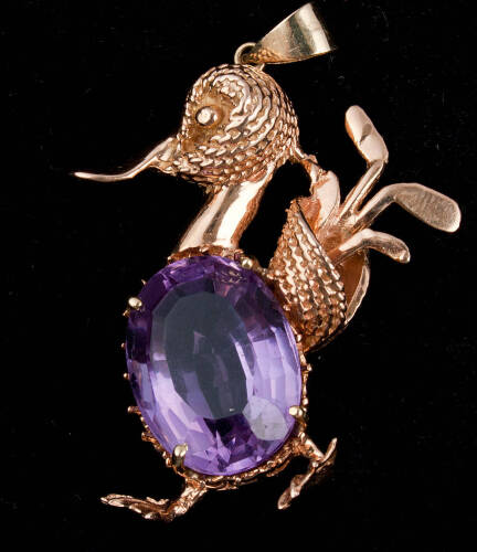 14K gold pendant, of a duck carrying golf clubs, with large inset amethyst
