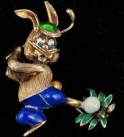 14K gold pin, shaped like a golfing rabbit with color porcelain onlay