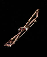 Old gold pin, with mounted pearls and rubies, circa 1900