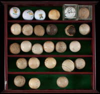 Collection of golf balls, from vintage to modern