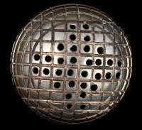 Silver pin cushion shaped like a golf ball