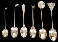 Six silver spoons with golf decoration