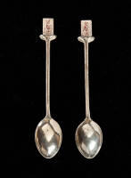 Two sterling silver spoons awarded for "Best Gross" at S.G.C.