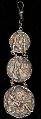 Silver plated watch fob with golf illustrations