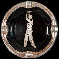 Glass ashtray with silver onlay illustration of golfer, and silver lip