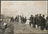 Original photograph taken by Jack London at the Battle of Yalu (Russo-Japanese War) on May 1, 1904. With original photograph of Father Damien's grave at Molokai, Hawaii