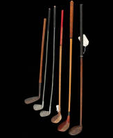 Six children's golf clubs