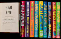 Seventeen titles by Janet Evanovich, eight of them signed