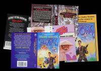 Collection of book cover proofs (paperbacks and dust jackets) for various Andre Norton titles