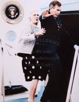 Photograph of President and Mrs. Bush boarding Air Force One