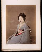 Album with 50 mounted hand-colored albumen photographs of Japan