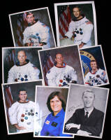 Collection of 8 photolithographic prints signed by astronauts
