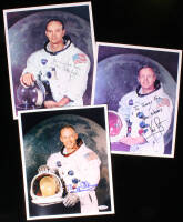 Photographs of Apollo XI Astronauts Neil Armstrong, Buzz Aldrin and Michael Collins, each signed and/or inscribed