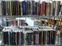 Approximately 128 volumes Thrillers, Fantasy, Science Fiction, etc. Including: John Grishom, John Sandford, Martin Cruz Smith, Tad Williams, etc.