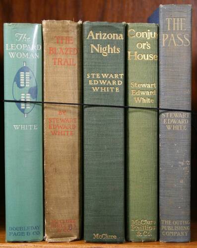 Lot of five volumes by Stewart Edward White, each signed and/or inscribed by the author