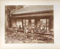 Album with 74 mounted hand-colored albumen photographs of Japan