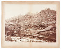 [Close-up View of the Off-Loading of the Wood from the Train to the Flume at the Summit]